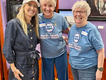 Rachel with community members