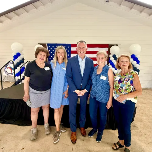 Rachel Grage greeting community members